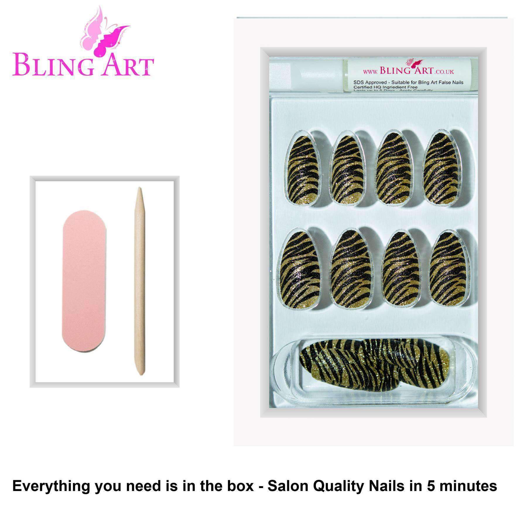 A set of 24 long almond stiletto false nails in black and gold glitter design, accompanied by a glue stick, nail file, and cuticle stick.