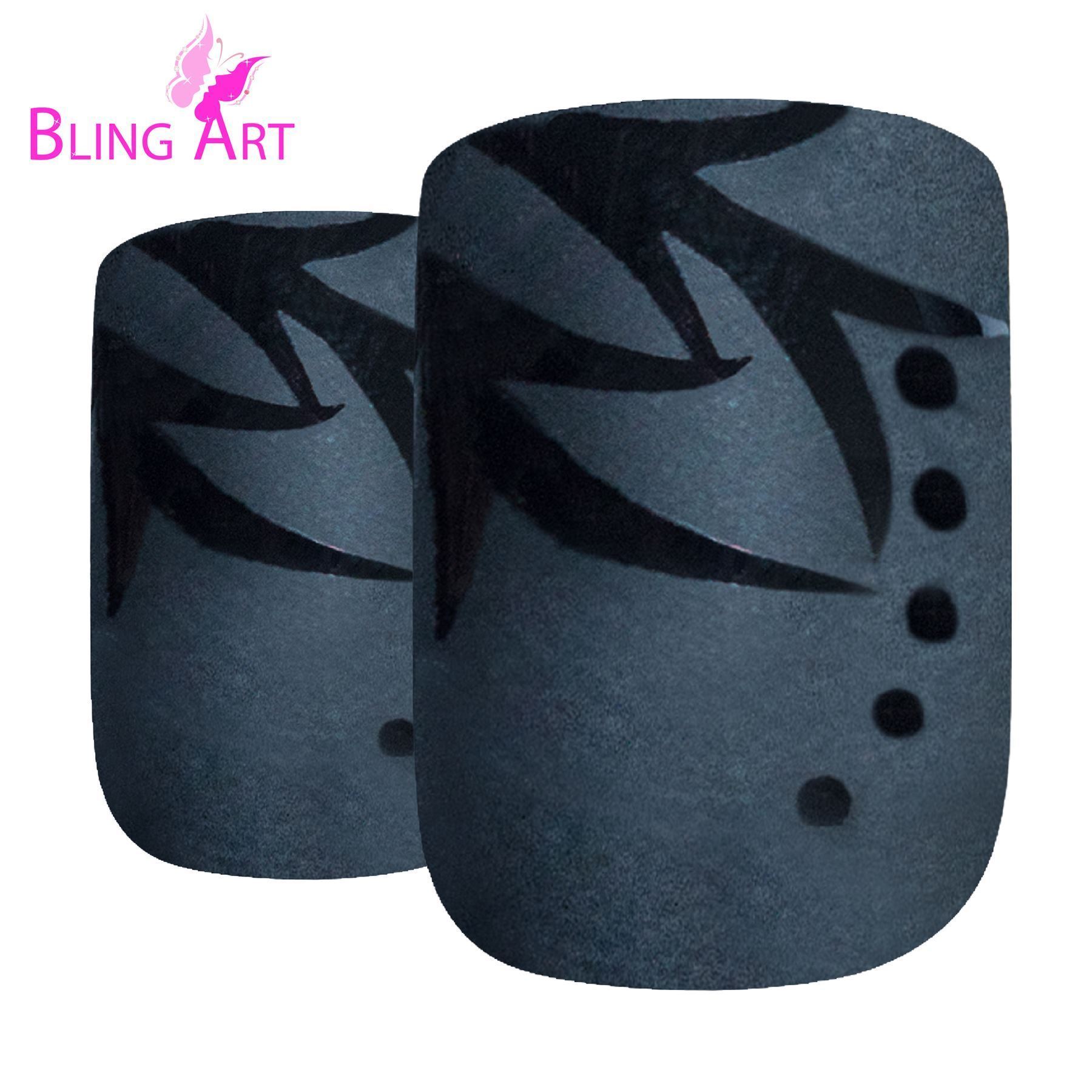 Bling Art Black Leaf Matte French Squoval false nails displayed in a stylish arrangement, showcasing their chic matte finish and elegant black leaf design.