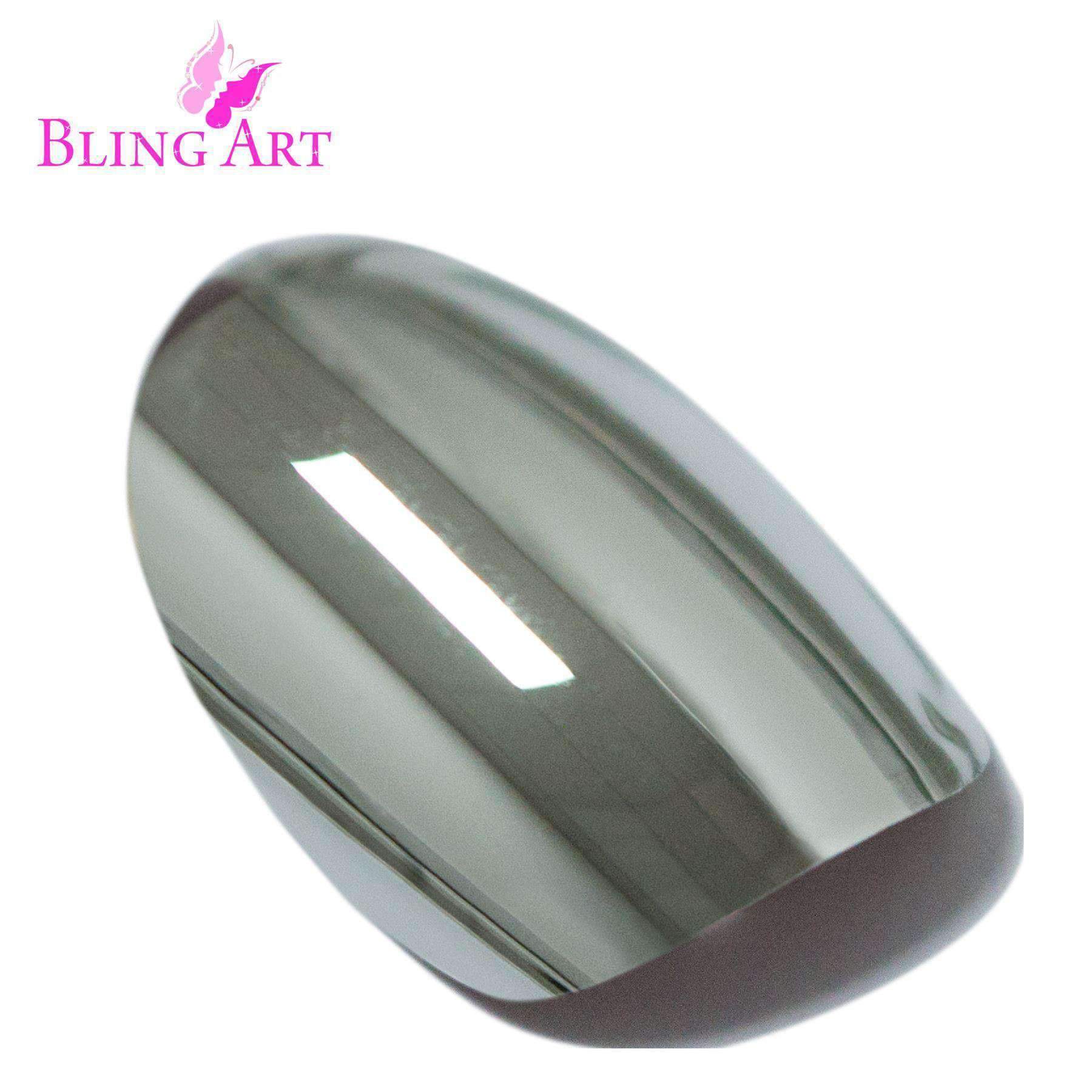 Bling Art Silver Chrome Metallic Oval Medium Fake Nails displayed with glue, nail file, and cuticle stick.