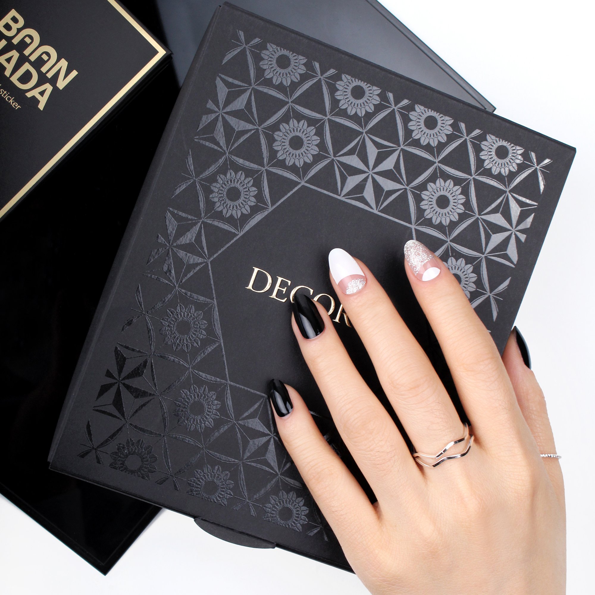 Milky Way self-adhesive nail polish strips showcasing various creative designs and sizes in a pack.