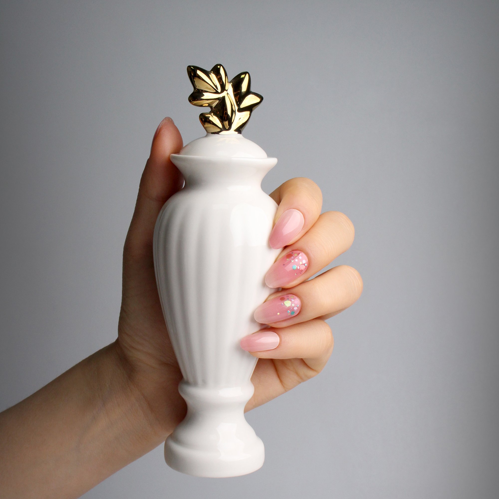 Pink Melody nail polish strips in various sizes, showcasing creative designs and vibrant colors for a stylish manicure.