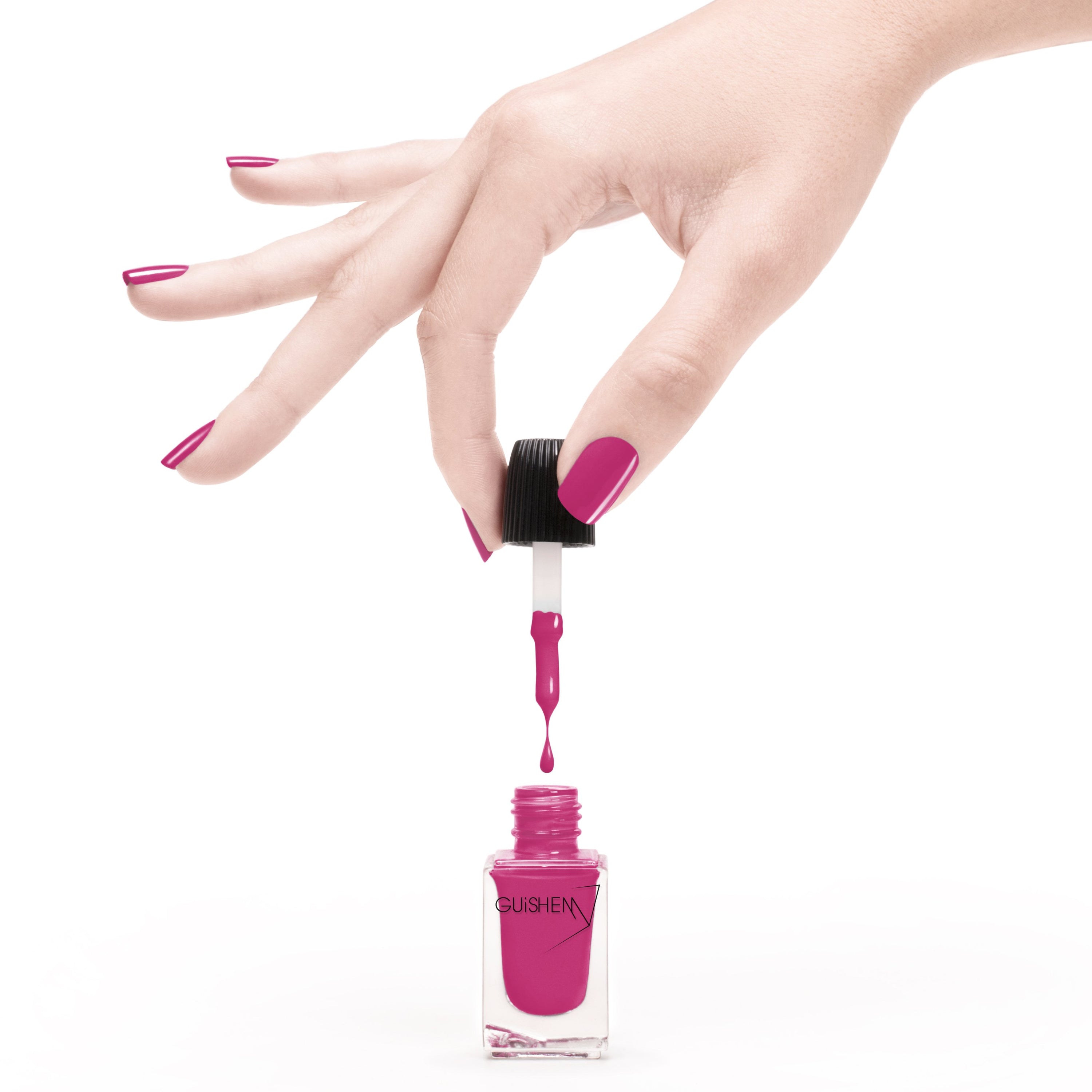 GUiSHEM Premium Nail Lacquer in FIESTA - 002, a vibrant hot pink crème nail polish in a stylish glass bottle with a custom brush.