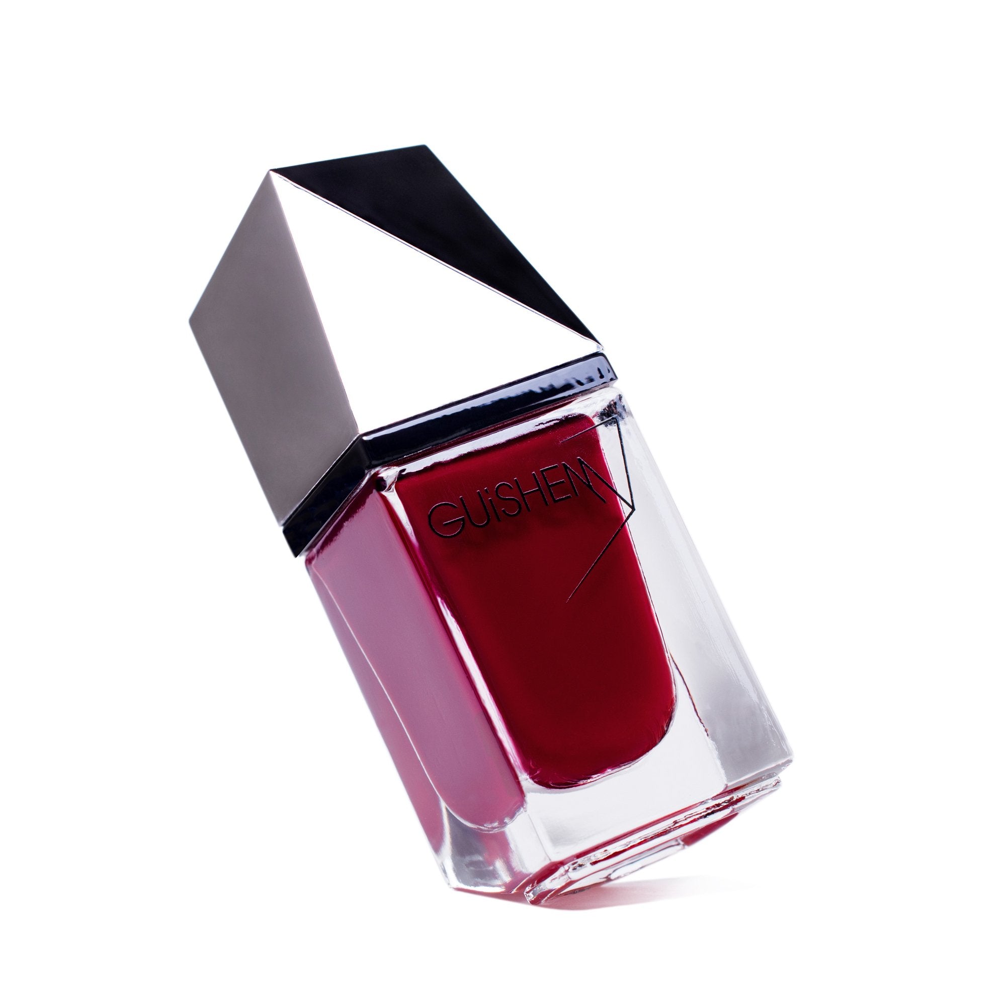 GUiSHEM Premium Nail Lacquer in PICANTE - 270, showcasing a vibrant red blood crème color in a modern glass bottle with a custom brush.