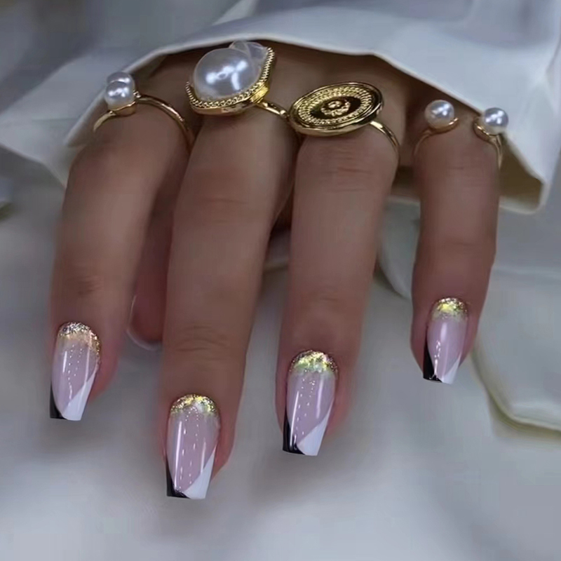 A complete Press On Nails Kit featuring 24 reusable nails, nail glue, gel stickers, and essential tools in a stylish storage box.