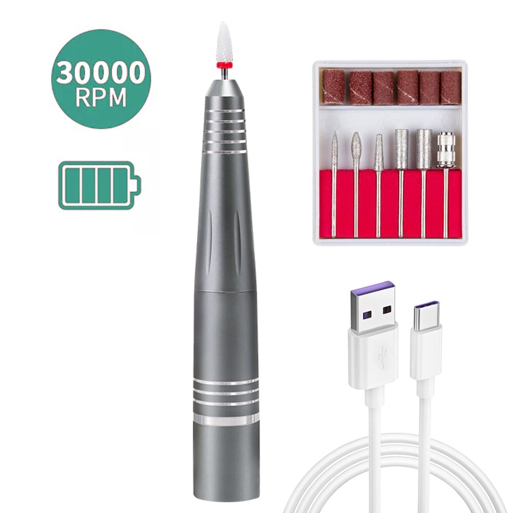 Rechargeable Electric Nail File Cordless Nail Drill Machine with various grinding heads and a sleek aluminum design.