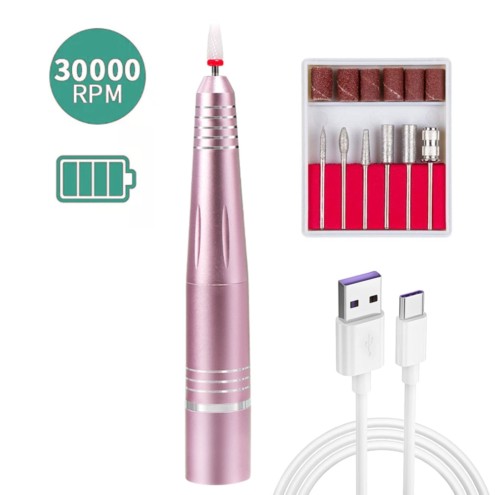 Rechargeable Electric Nail File Cordless Nail Drill Machine with various grinding heads and a sleek aluminum design.