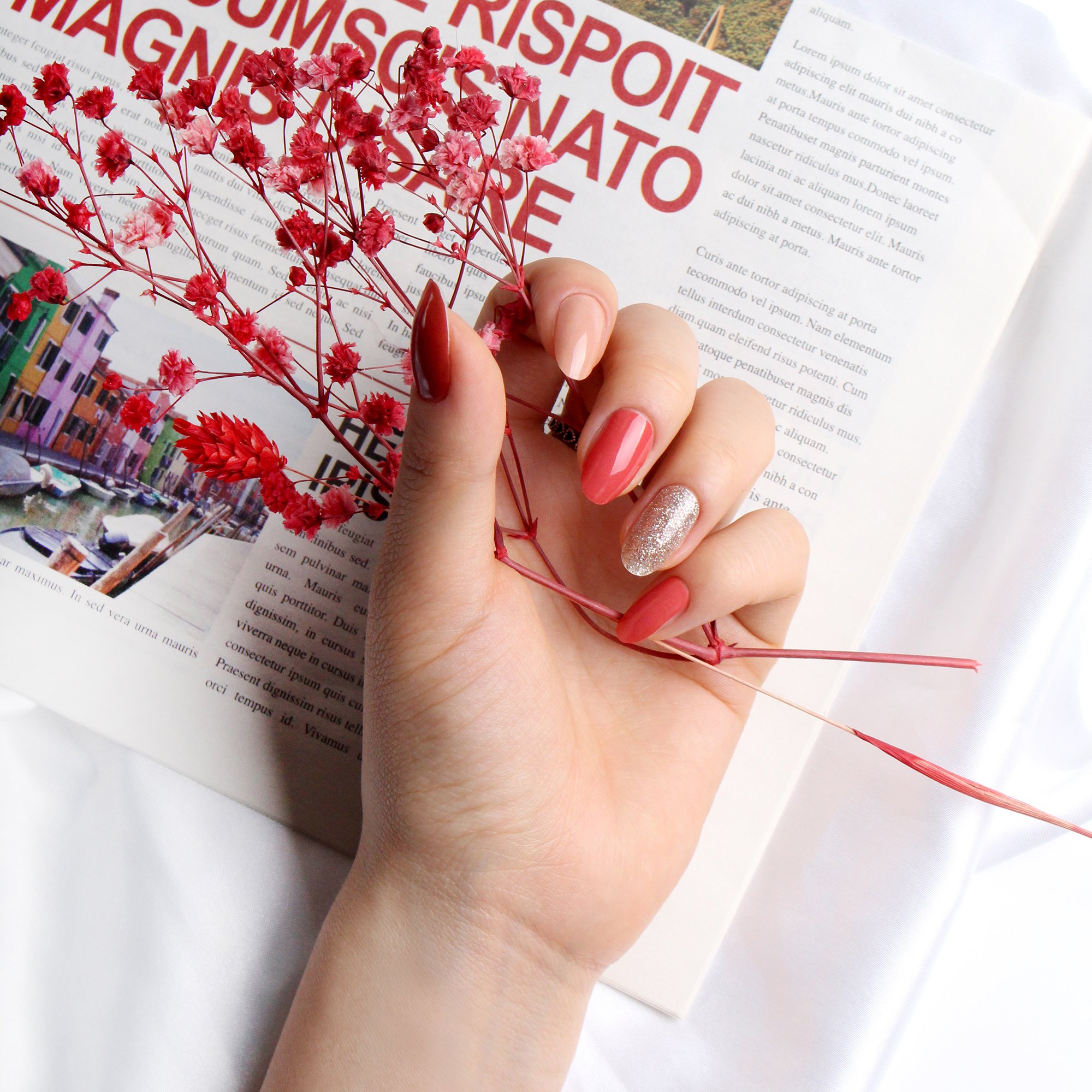 A vibrant pack of Red Party self-adhesive nail polish strips showcasing various creative designs and sizes.