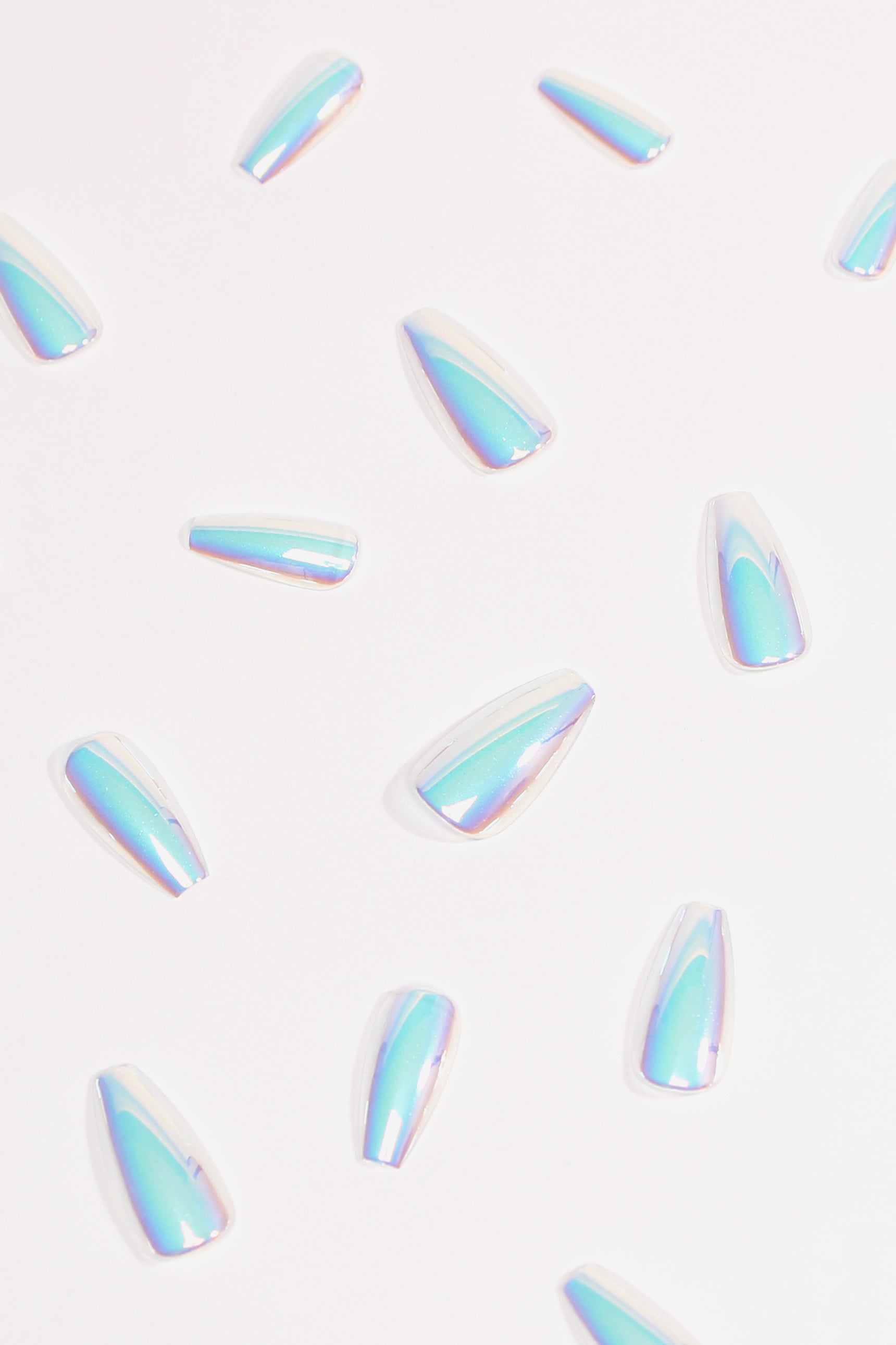 Soda Pop press-on nails with a shimmering chrome finish, showcasing vibrant colors and a stylish design.