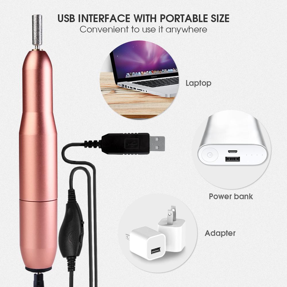 USB Nail Drill Set in rose gold color with six metal bits and USB power cord, ideal for portable nail care.