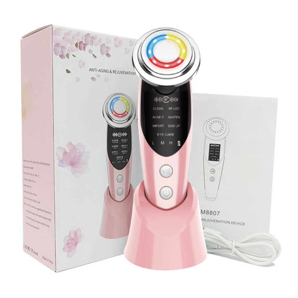7 in 1 Face Massager in pink and white, showcasing its sleek design and multifunctional features for skincare.