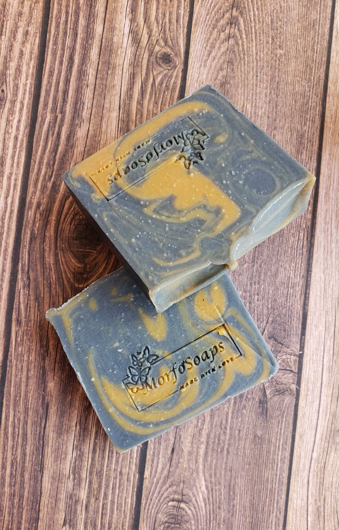 Antiseptic Handmade Soap bar with organic ingredients, showcasing its unique texture and color variations.