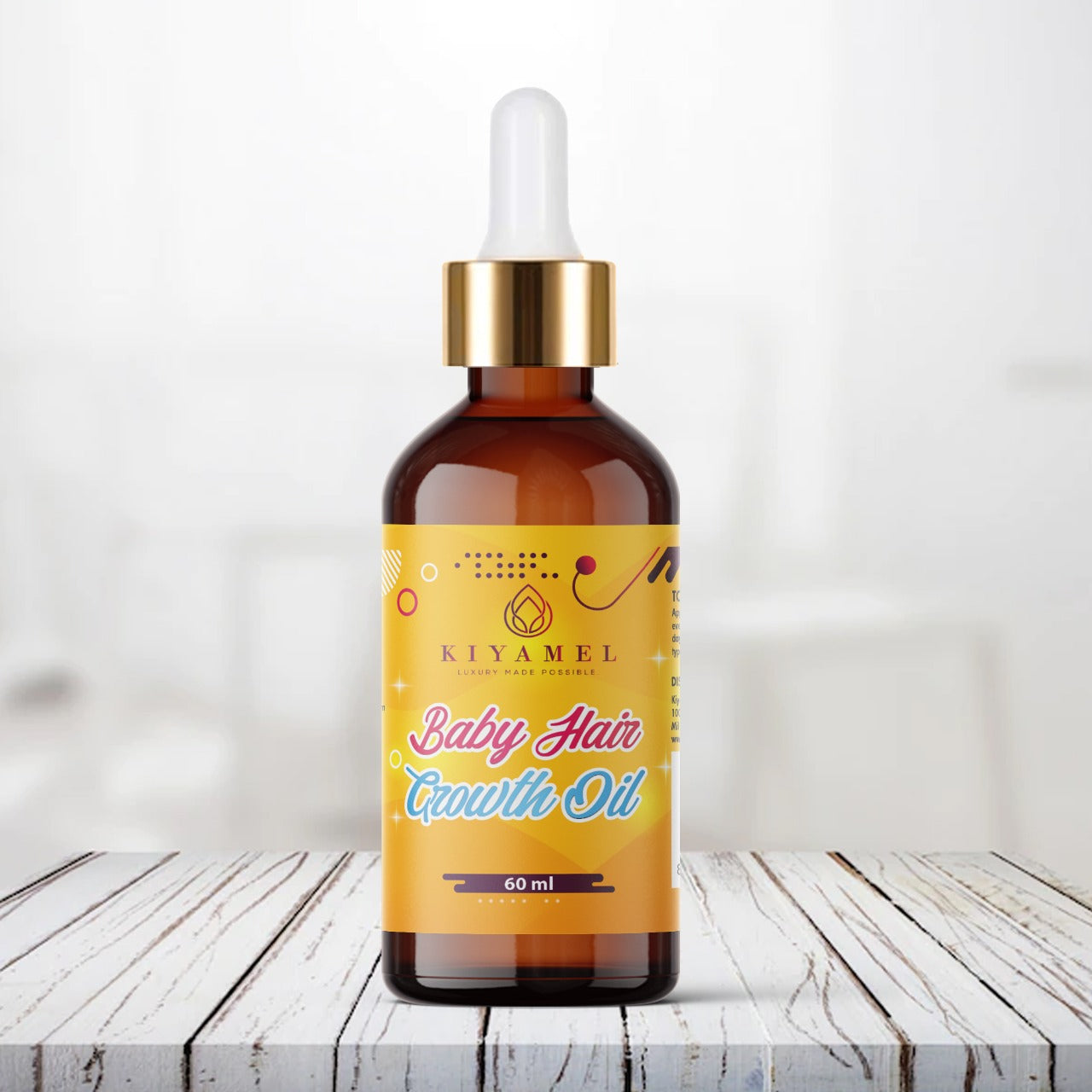 Kiyamel Baby Hair Growth Oil bottle with dropper, showcasing natural ingredients for healthy hair growth.
