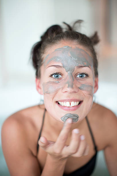 Bamboo Charcoal Skin Detoxing Facial mask in a jar, showcasing its creamy texture and natural ingredients.