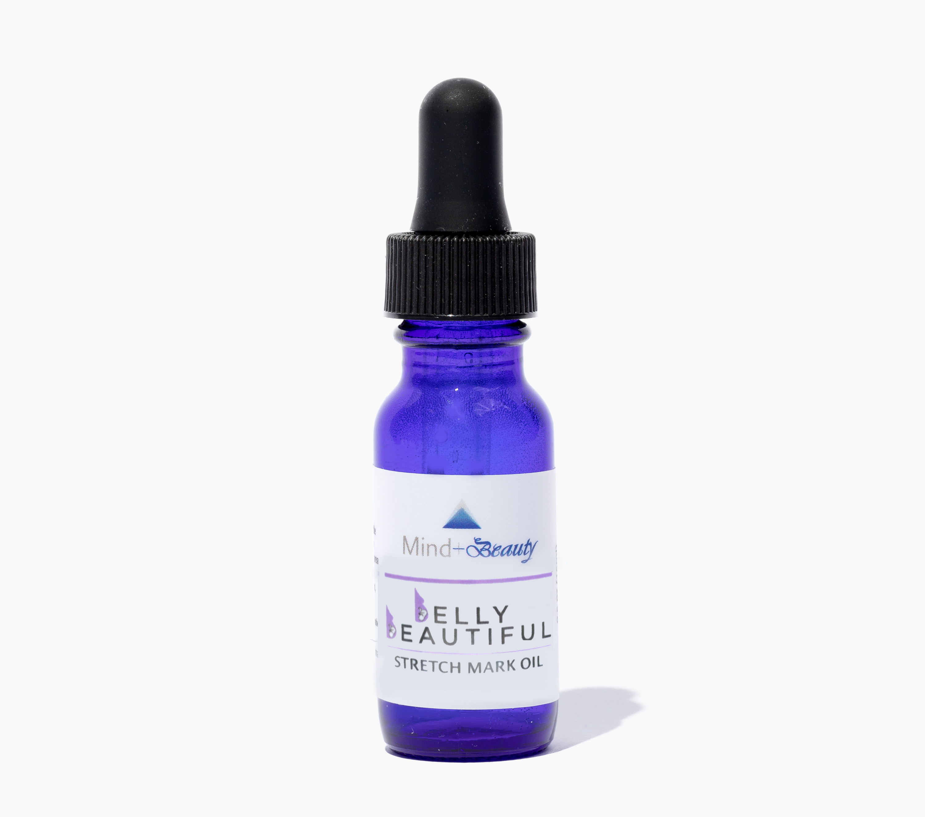 Belly Beautiful Oil bottle with a rich golden oil inside, designed for reducing pregnancy stretch marks.