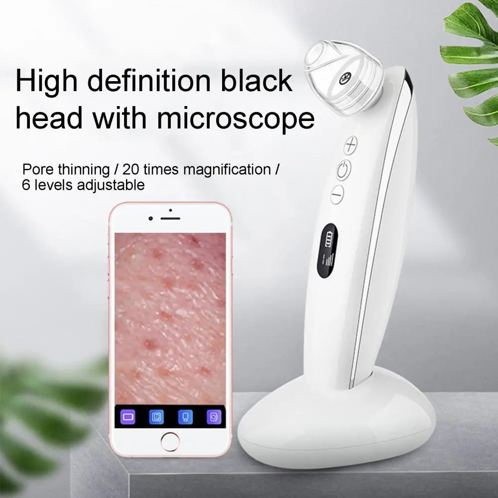 Blackhead Remover Pore Vacuum Cleaner with multiple suction heads and USB charging cable, designed for effective skin care.