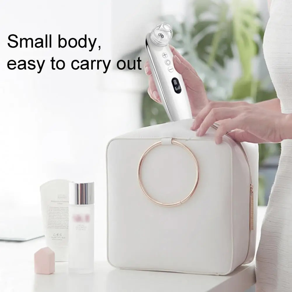 Blackhead Remover Pore Vacuum Cleaner with multiple suction heads and USB charging cable, designed for effective skin care.