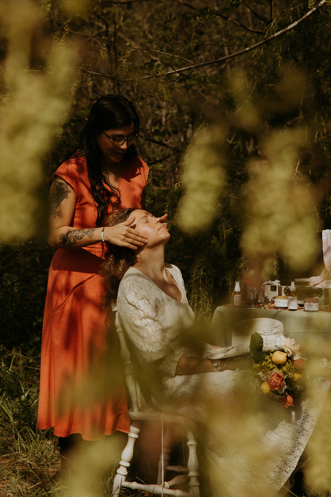 A 2oz glass bottle of Calendula Moisturizing Oil with a pump top, showcasing its natural ingredients and elegant design.