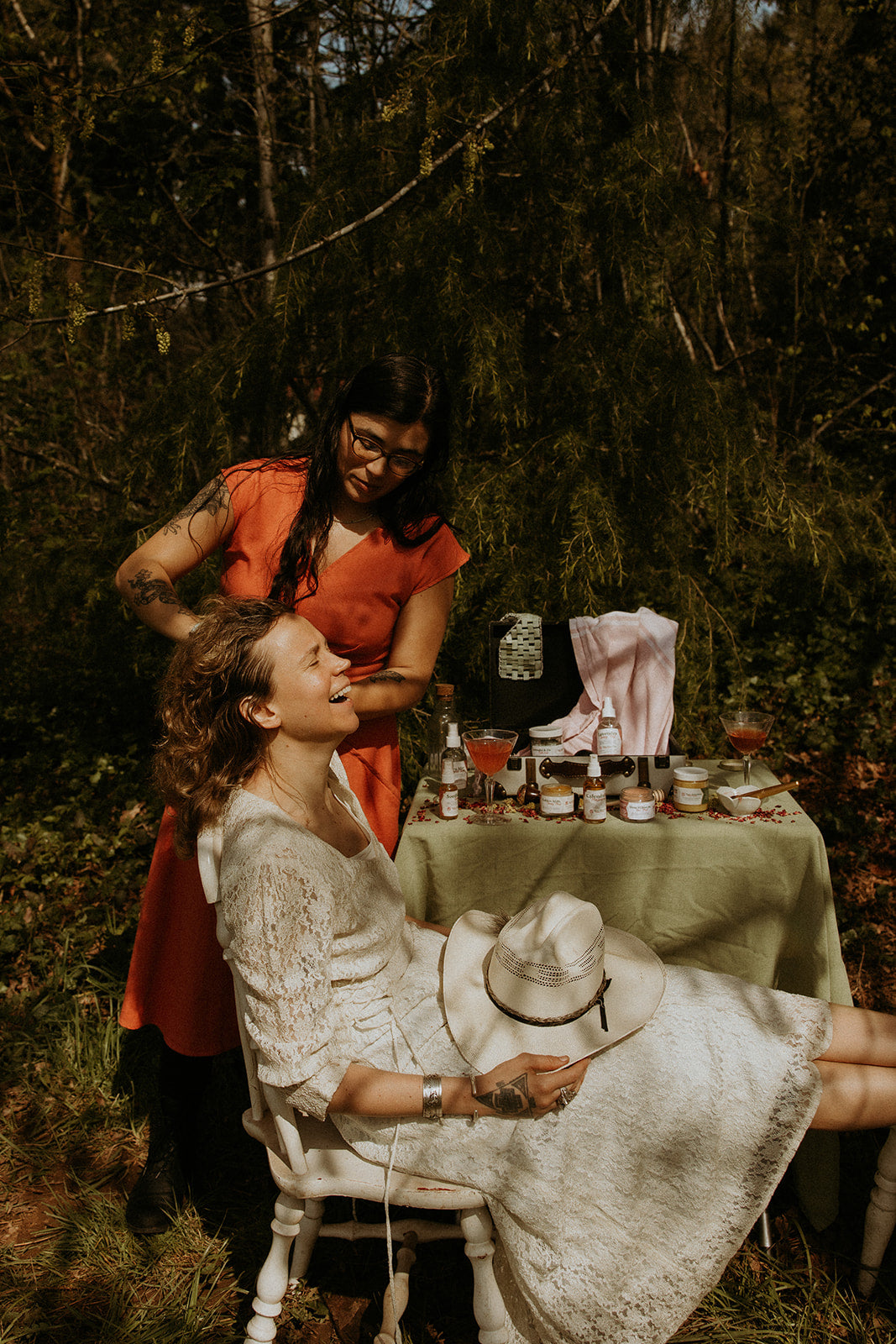 A 2oz glass bottle of Calendula Moisturizing Oil with a pump top, showcasing its natural ingredients and elegant design.