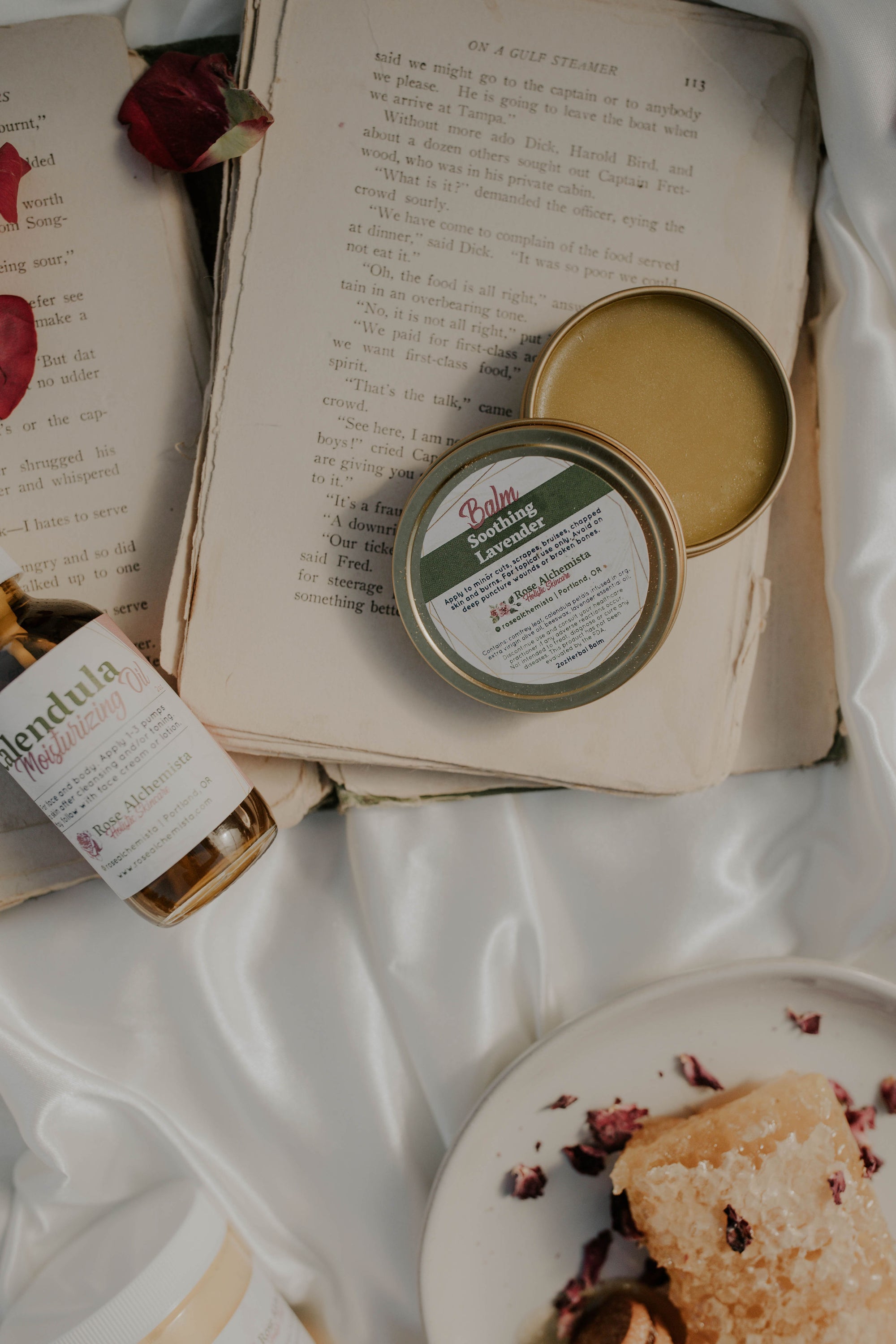 A 2oz glass bottle of Calendula Moisturizing Oil with a pump top, showcasing its natural ingredients and elegant design.