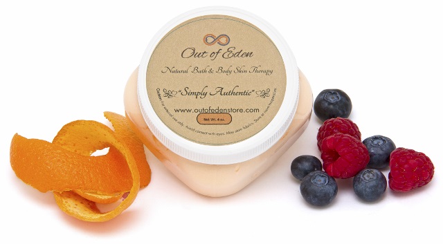 Citrus Berri Whipped Body Cleanser in a stylish container, showcasing its whipped mousse texture and vibrant citrus color.