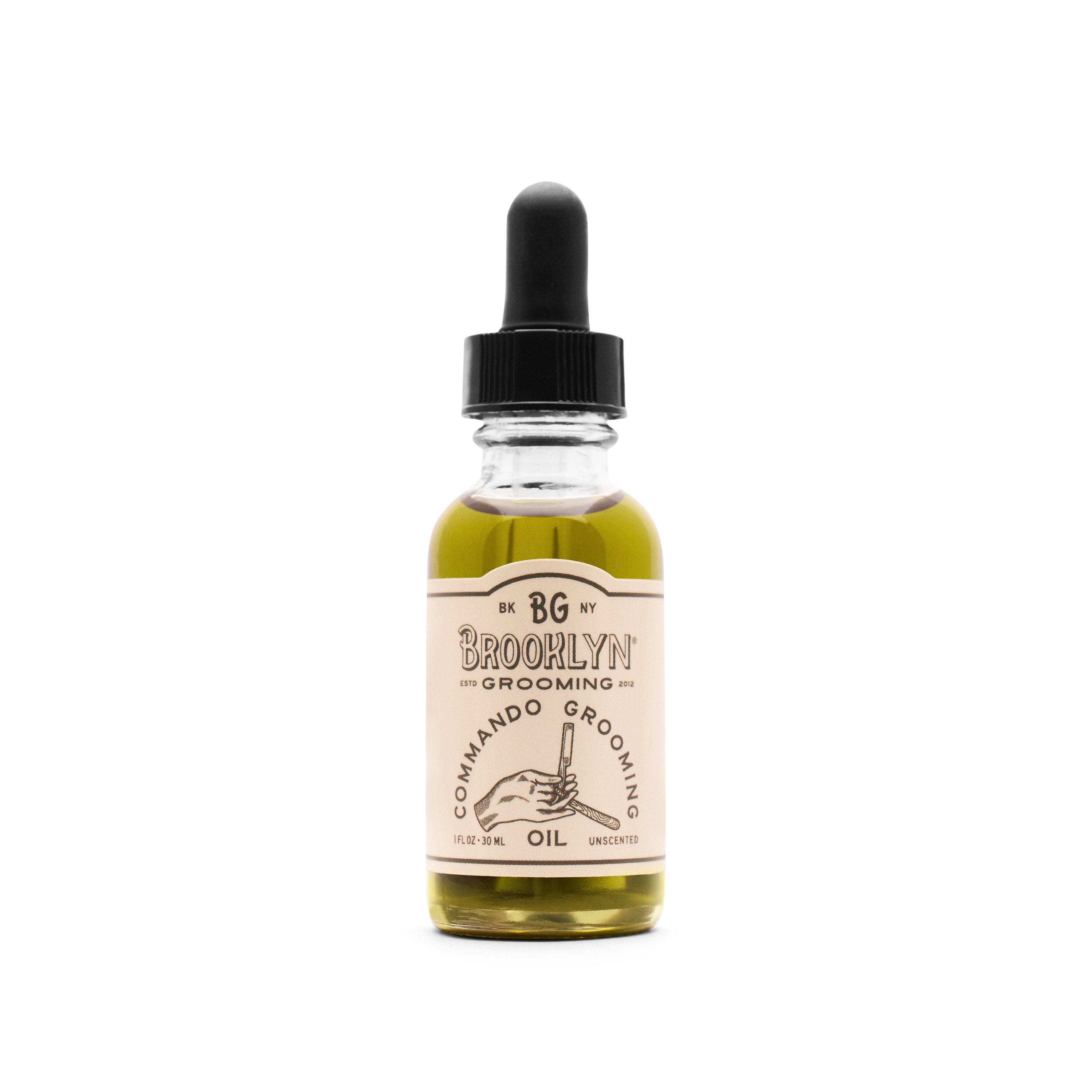 Bottle of Commando Grooming Oil with a sleek design, showcasing its versatility for beard, face, and shaving care.