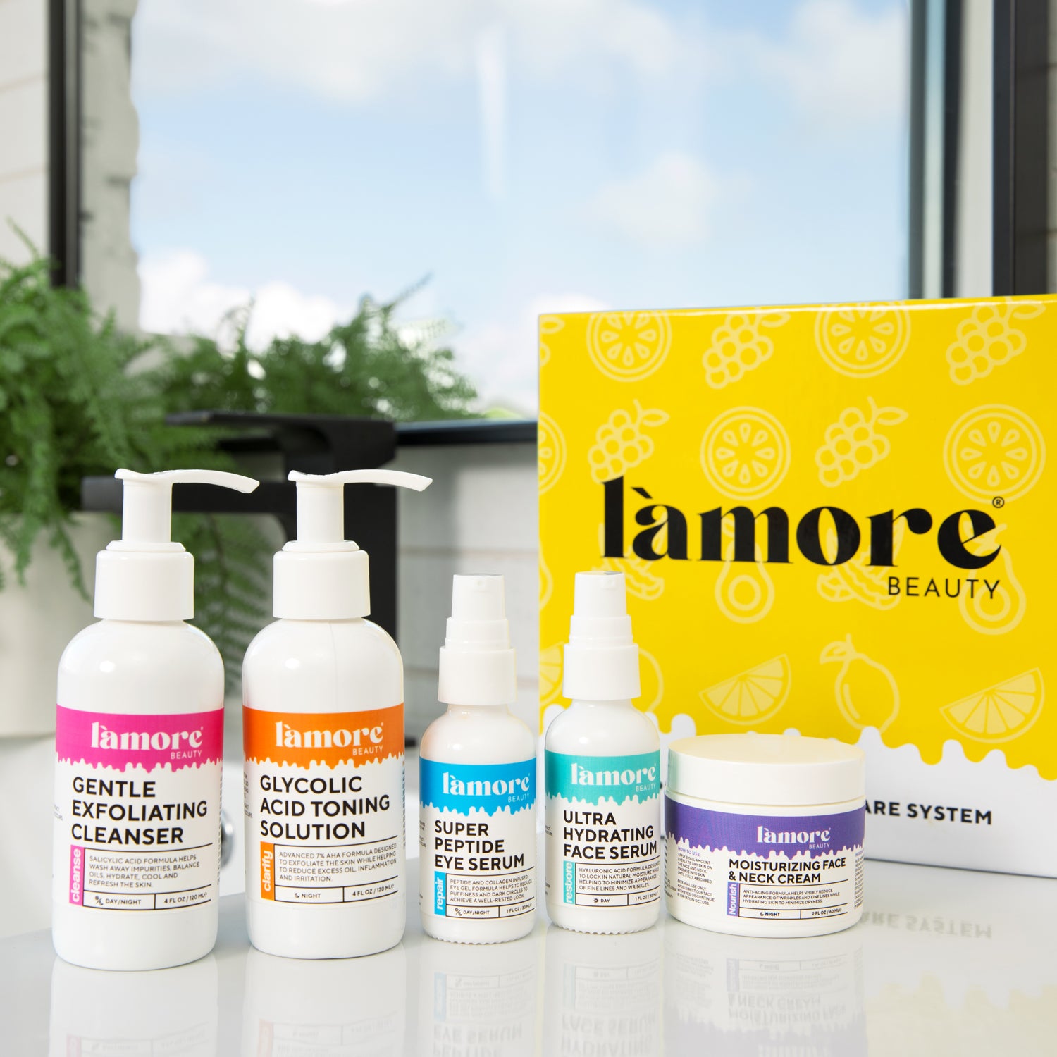 L'amore Complete 5-Step Skincare System featuring five skincare products including cleanser, toner, serum, eye serum, and moisturizer.