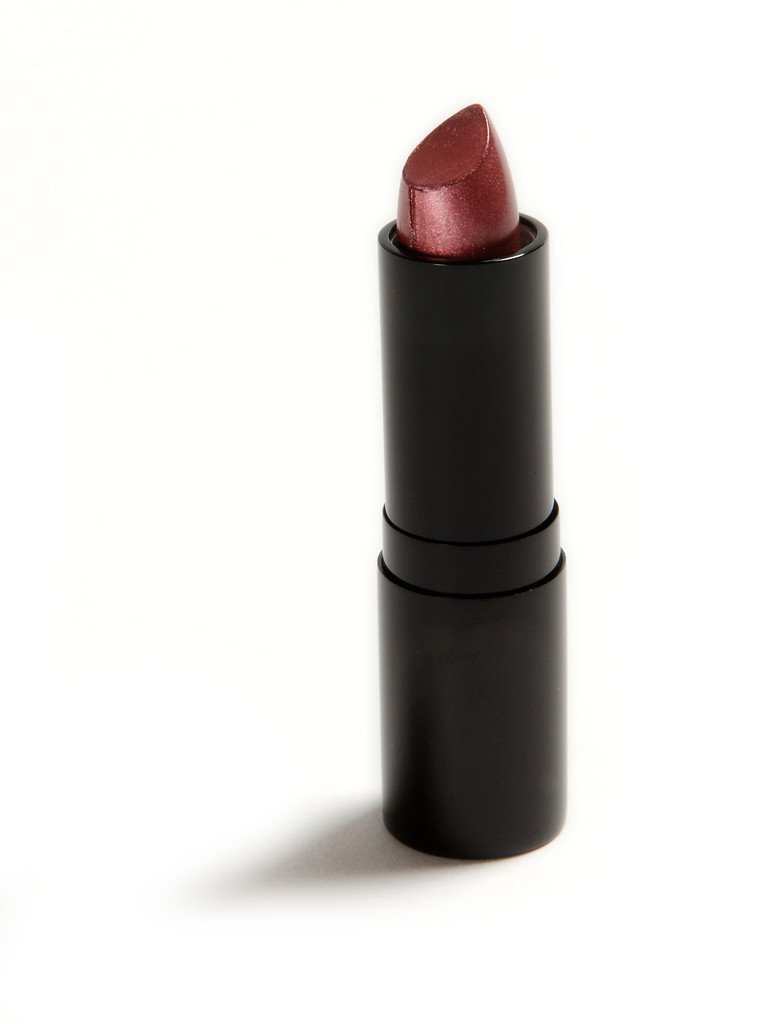Danyel' Lipstick in Earth Glow, showcasing a vibrant, rich color in a sleek tube, perfect for long-lasting wear.
