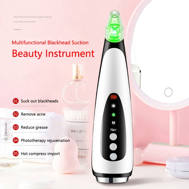 Electric Blackhead Remover with multiple suction tips and beauty lamp for effective skin care.