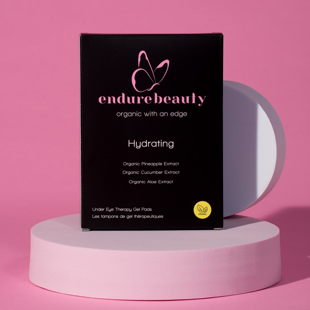 Endure™ Beauty Organic Hydrating Under Eye Therapy Gel Pads displayed on a soft surface, showcasing their organic ingredients and soothing properties.