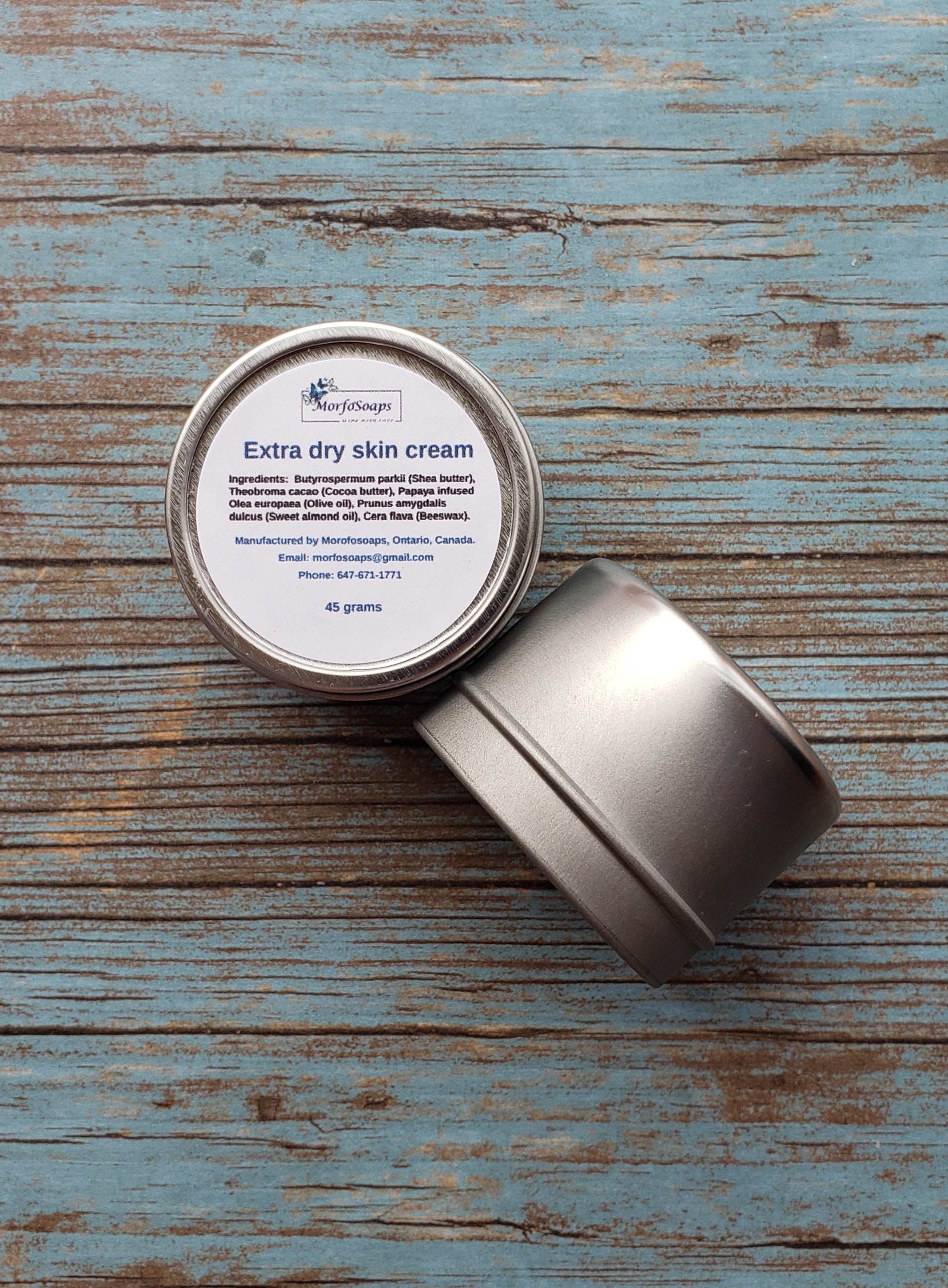 A jar of Morfosoaps Extra Dry Skin Cream with a smooth, creamy texture, showcasing its natural ingredients and luxurious appeal.