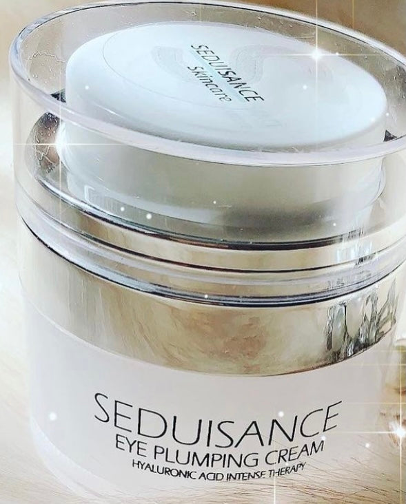 A luxurious jar of Eye Plumping Cream with Hyaluronic Acid, showcasing its rich texture and elegant packaging, designed for rejuvenating the eye area.