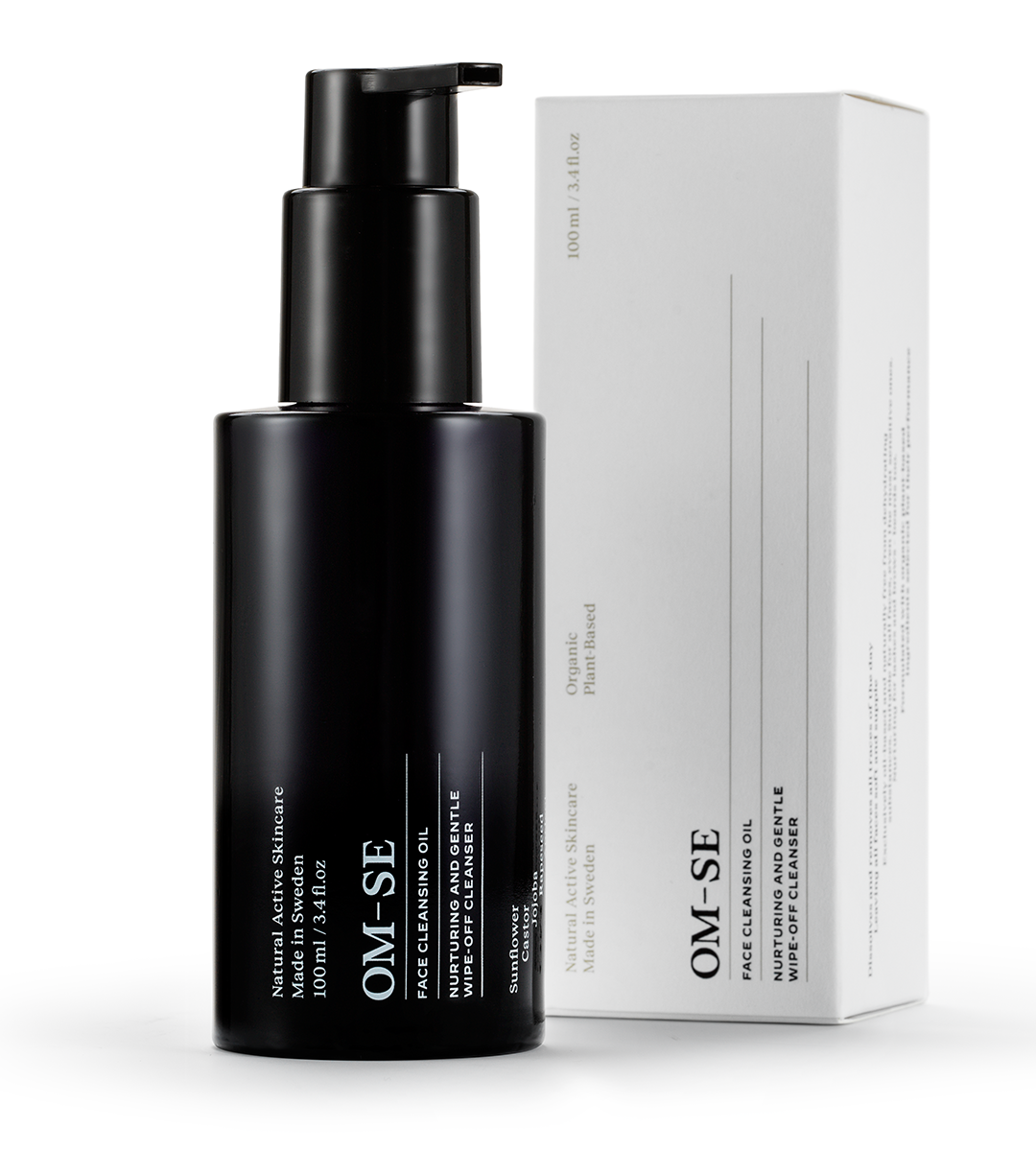 A bottle of Face Cleansing Oil with a dropper, showcasing its rich, golden oil texture, surrounded by organic ingredients.