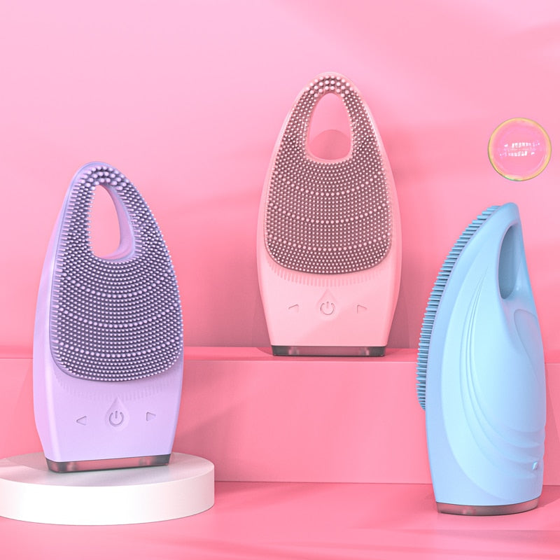Electric Facial Cleansing Brush in pink color with dual-zone bristles, designed for deep cleansing and facial massage.