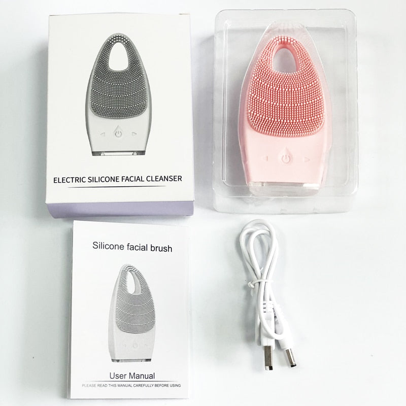 Electric Facial Cleansing Brush in pink color with dual-zone bristles, designed for deep cleansing and facial massage.
