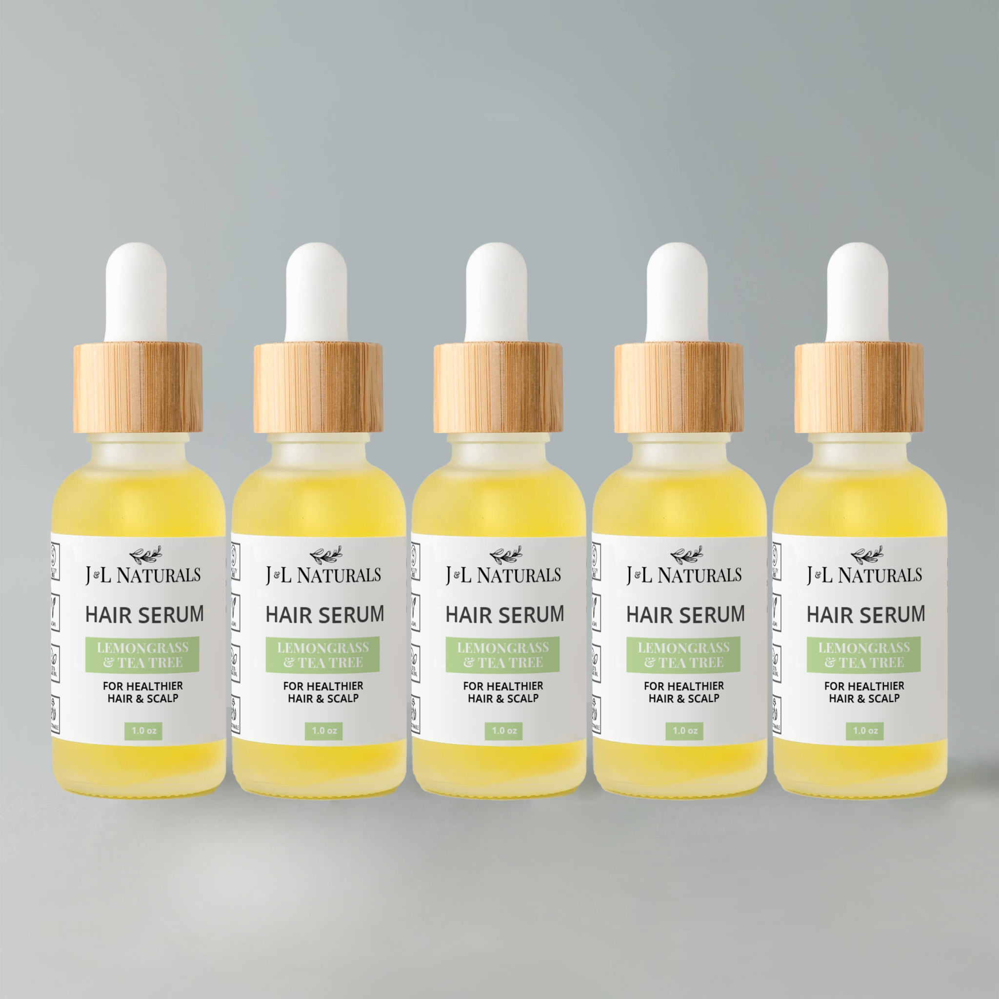 Hair Serum Bundle (5-Pack) featuring various serums for different hair types in elegant packaging.