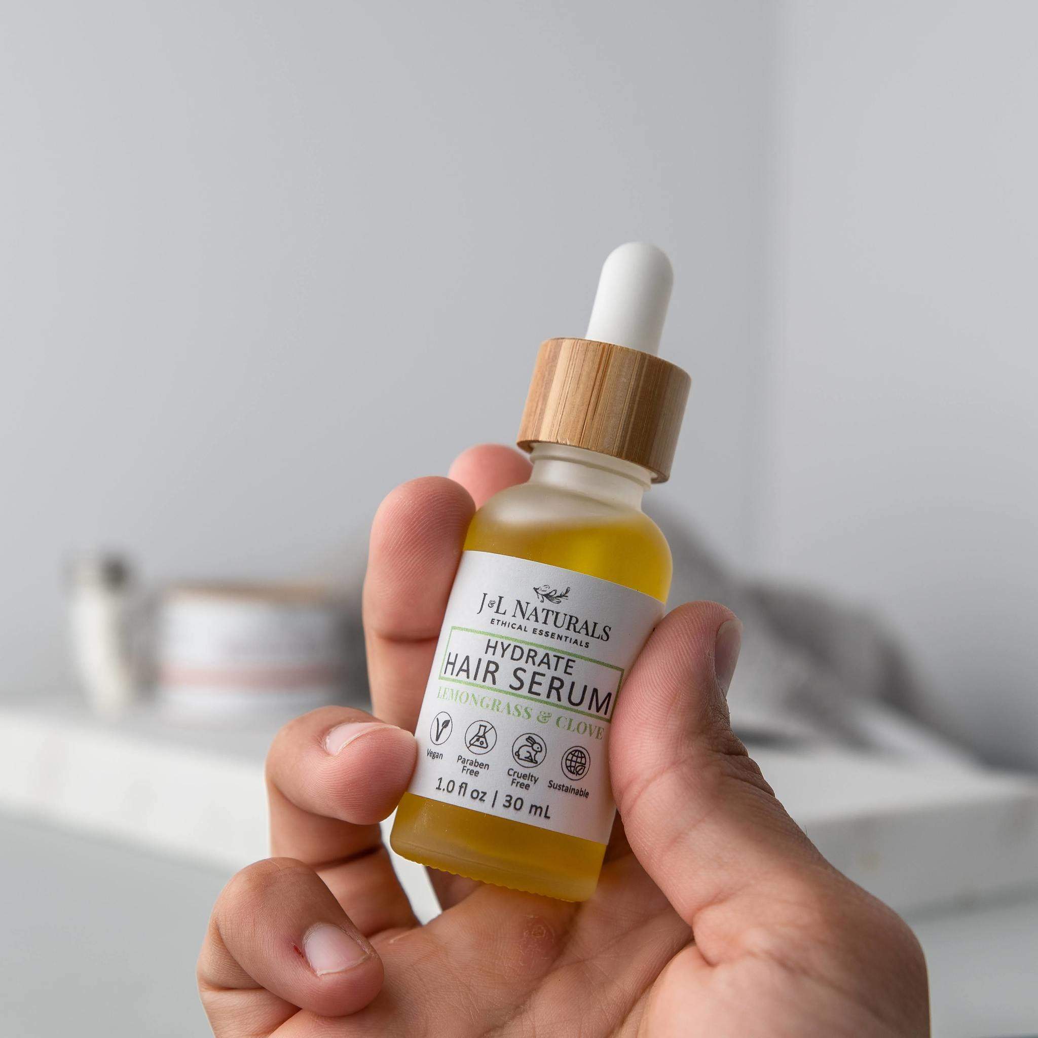 Hair Serum Bundle (5-Pack) featuring various serums for different hair types in elegant packaging.