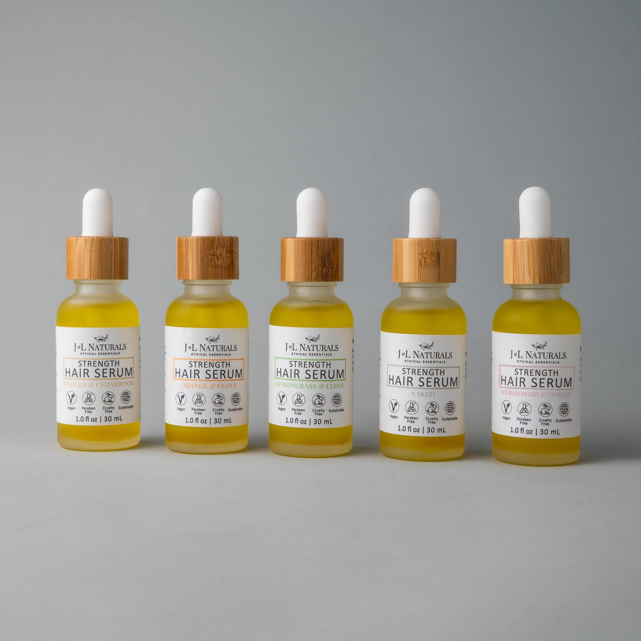Hair Serum Bundle (5-Pack) featuring various serums for different hair types in elegant packaging.