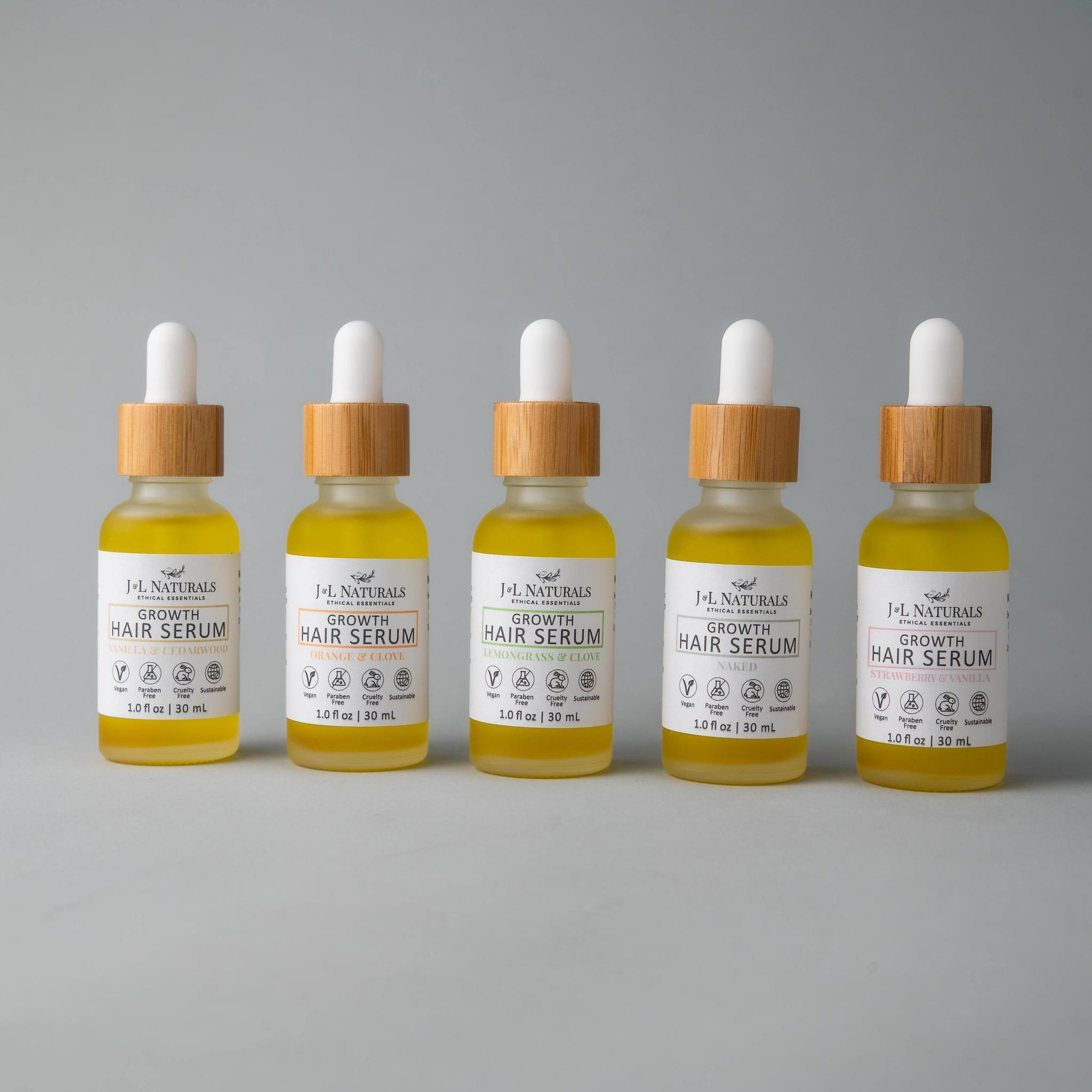Hair Serum Bundle (5-Pack) featuring various serums for different hair types in elegant packaging.