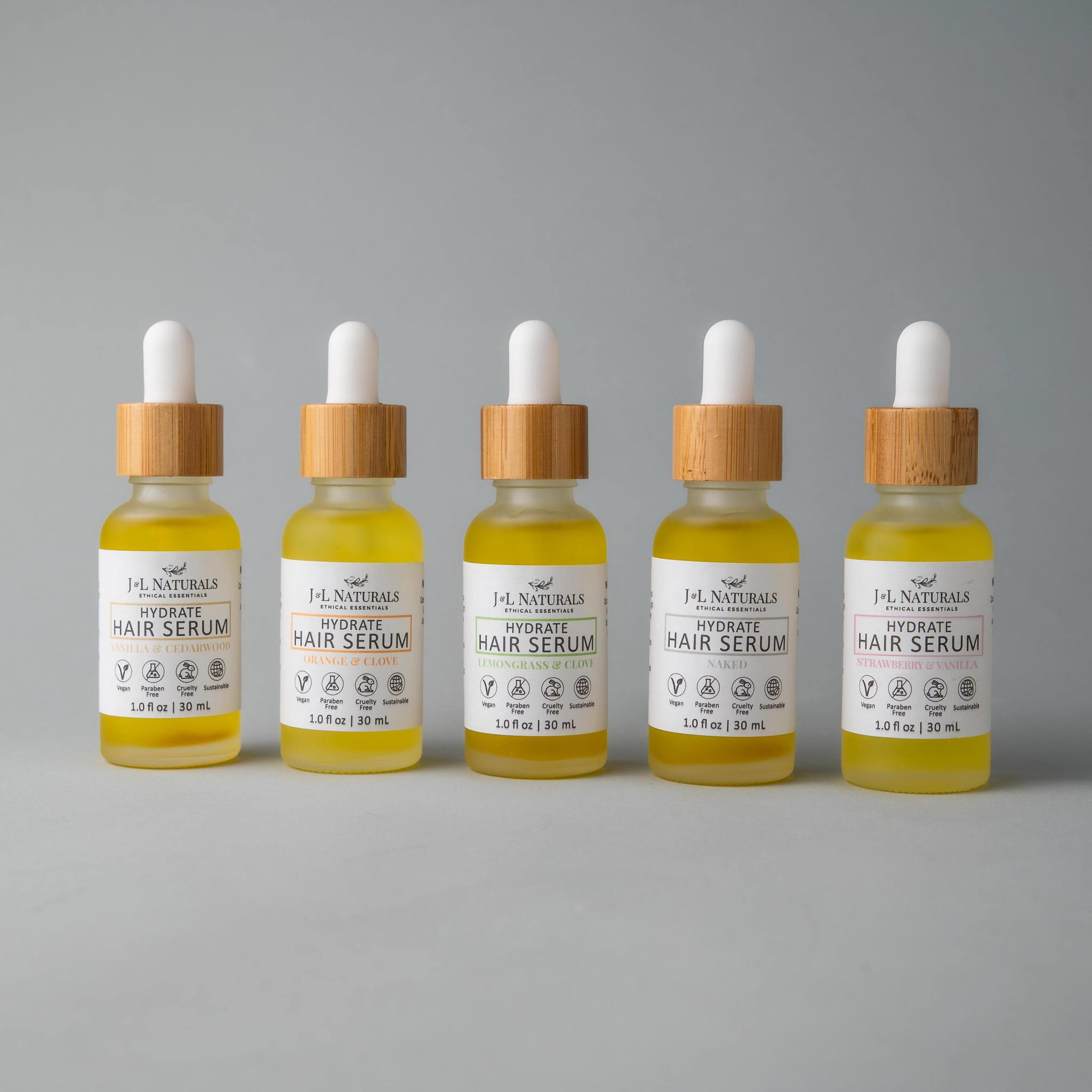 Hair Serum Bundle (5-Pack) featuring various serums for different hair types in elegant packaging.