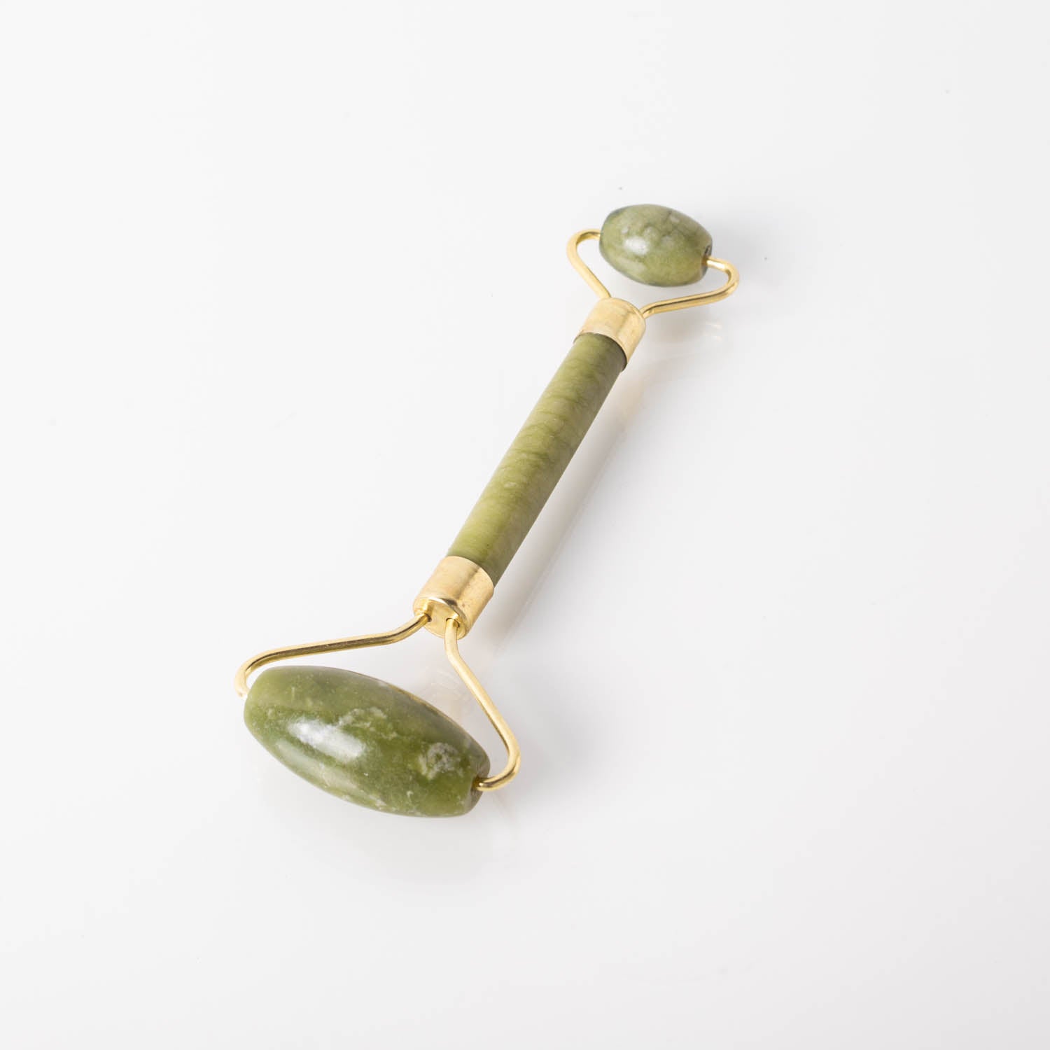 Holysticspa Jade Face Roller with a smooth green jade surface, designed for facial massage and skincare enhancement.