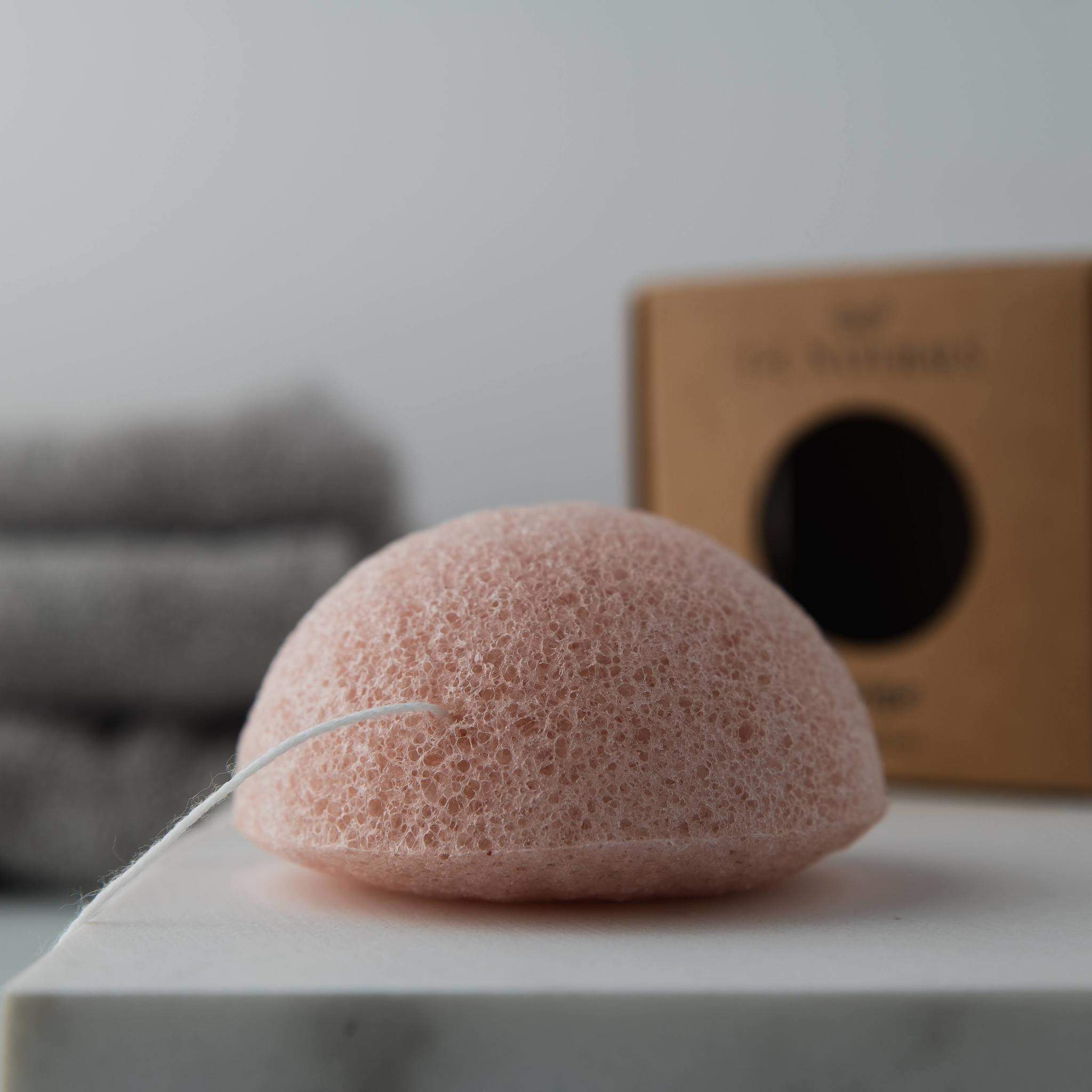 A biodegradable Konjac Sponge made from natural Konjac root, showcasing its soft texture and eco-friendly design.