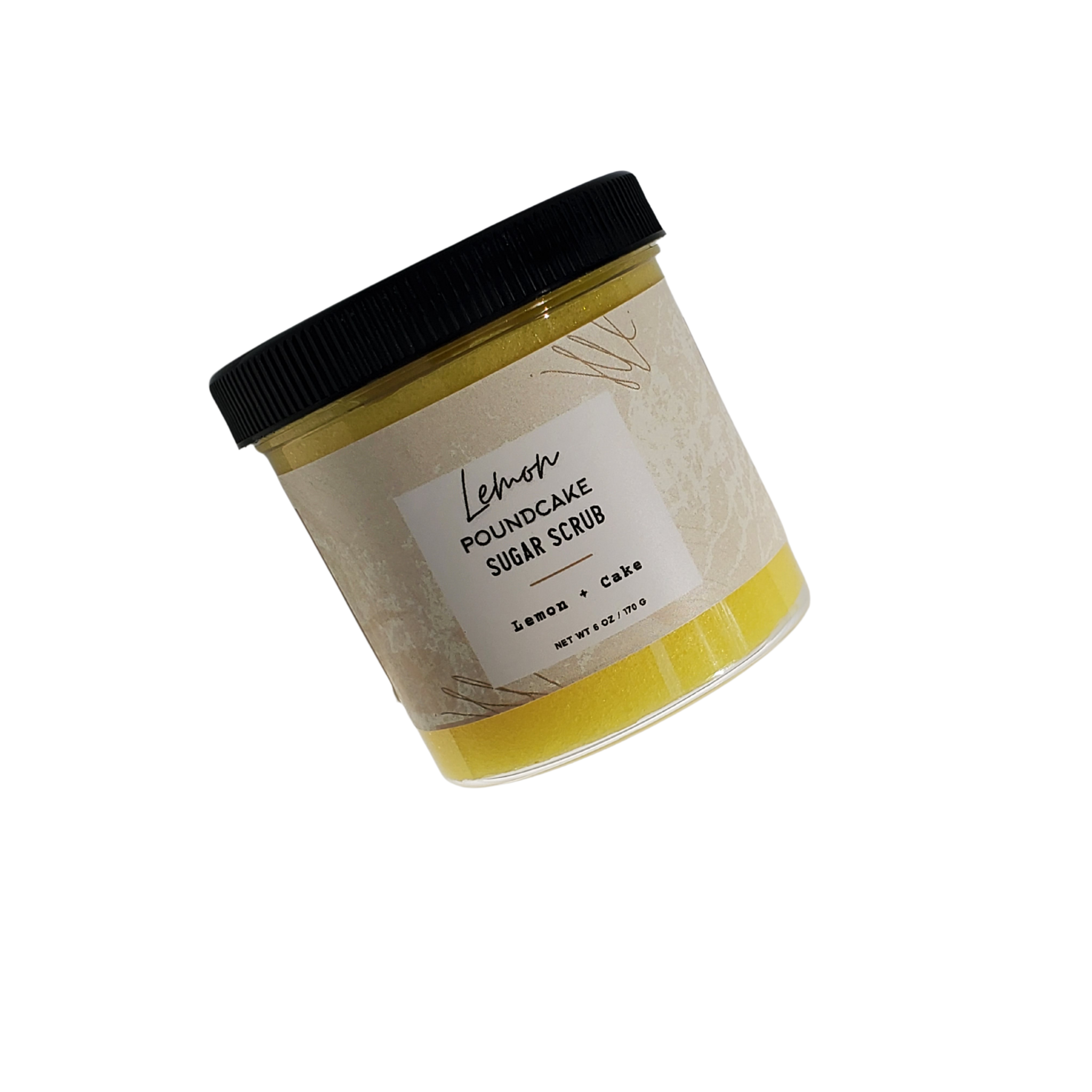 A jar of Lemon Pound Cake Sugar Scrub with a creamy texture, showcasing its vibrant yellow color and rich ingredients.