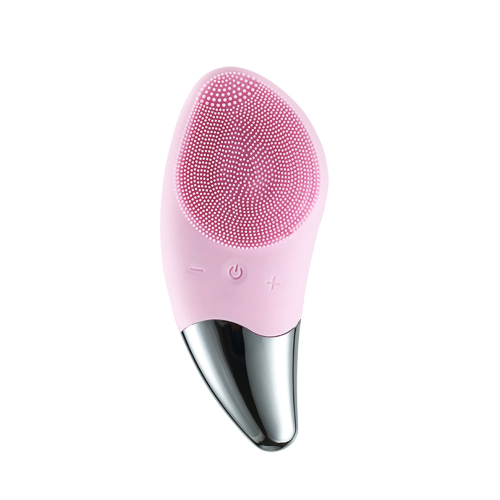 Mini Electric Facial Cleansing Brush in pink color with silicone bristles, designed for deep pore cleansing and facial massage.