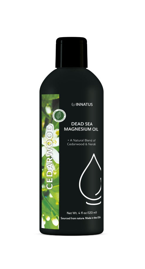 Natural Dead Sea Magnesium Oil with cedarwood and neroli, showcasing its luxurious texture and essential oil ingredients.
