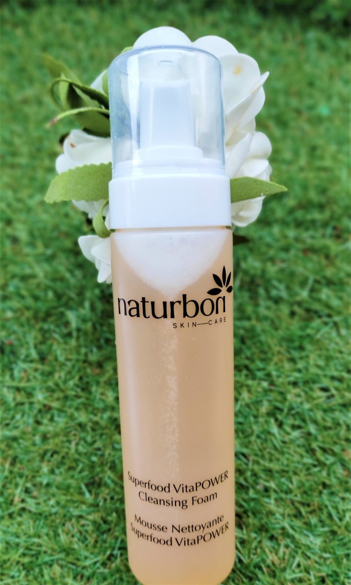Naturbon Superfood VitaPOWER Cleansing Foam Face Wash in a sleek 200ml bottle, showcasing its creamy texture and vibrant fruit ingredients.