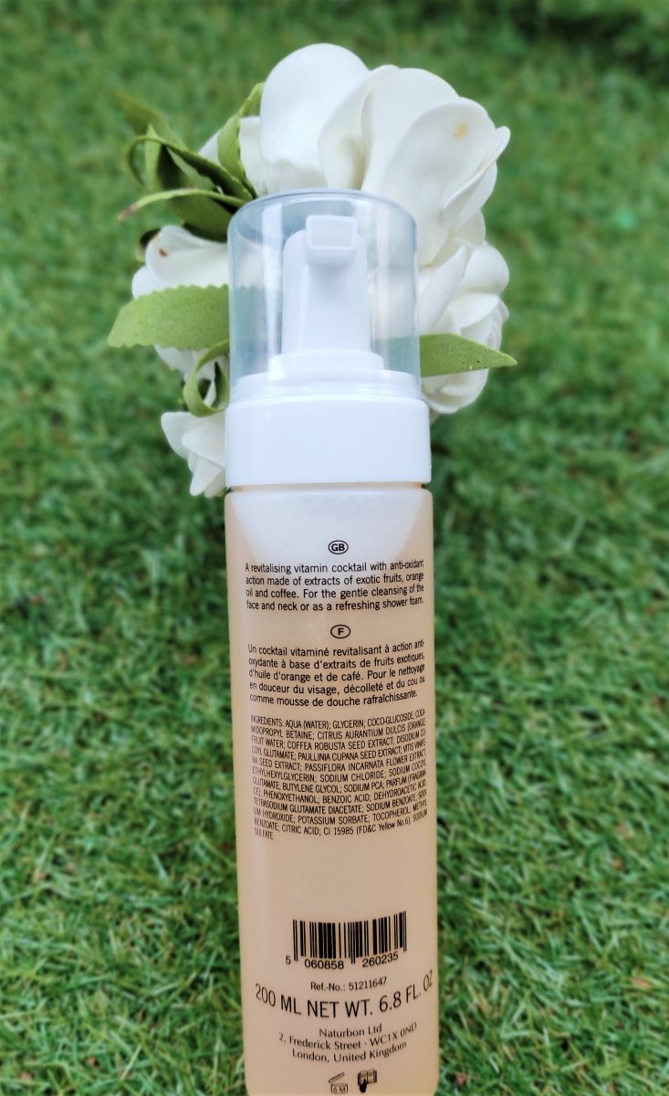 Naturbon Superfood VitaPOWER Cleansing Foam Face Wash in a sleek 200ml bottle, showcasing its creamy texture and vibrant fruit ingredients.