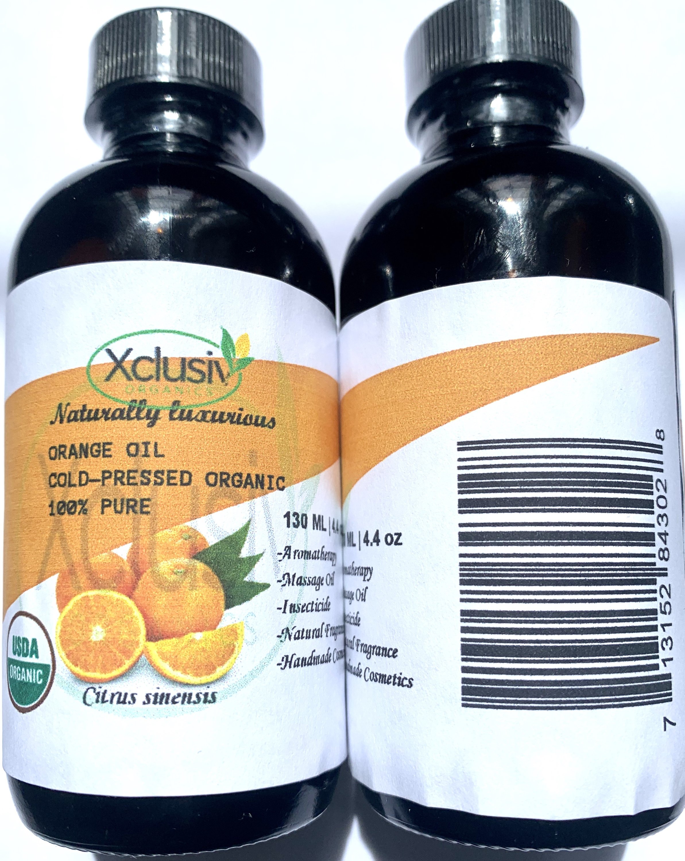 A 4.4 oz bottle of USDA Organic Cold-Pressed Orange Oil with a vibrant orange label, showcasing its natural essence and purity.