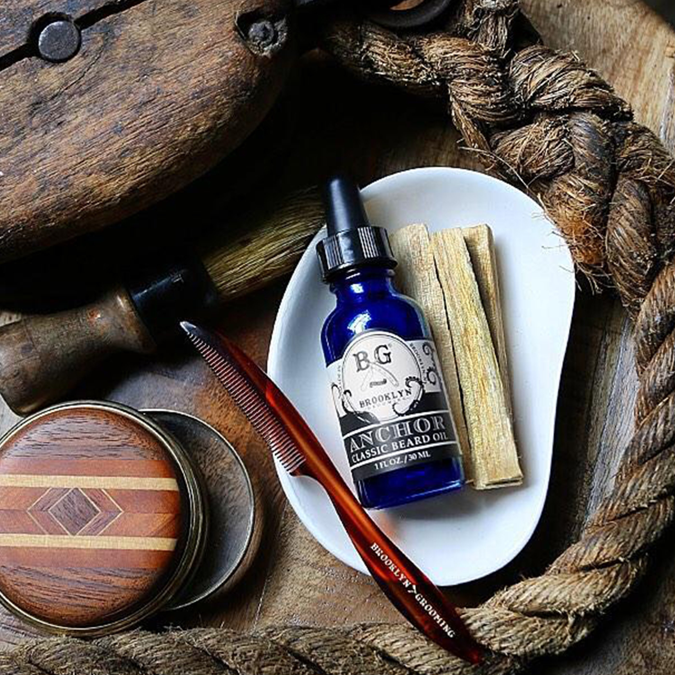 A bundle of five Palo Santo smudge sticks, showcasing their natural wood texture and earthy tones, perfect for cleansing rituals.