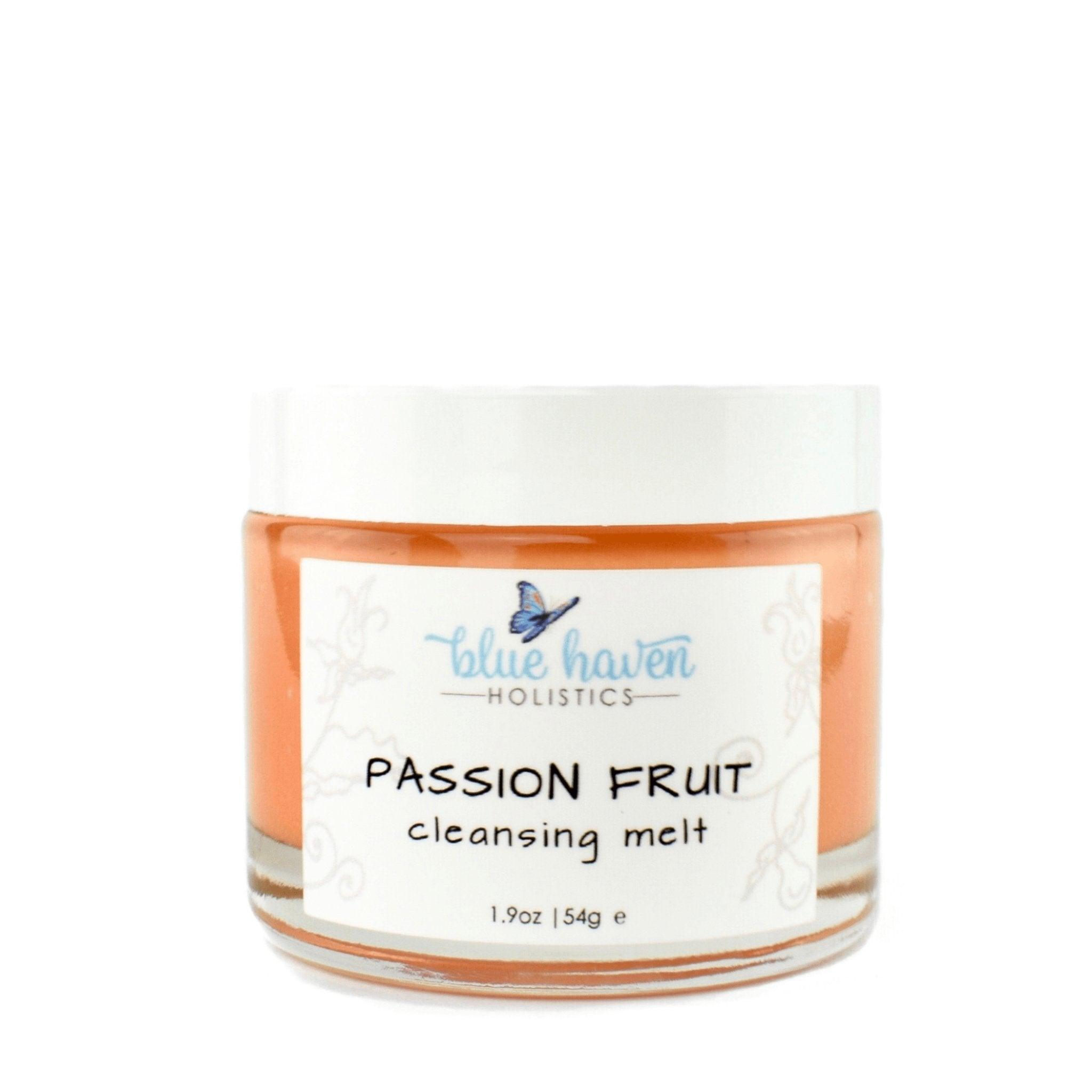 Passion Fruit Natural Oil Cleansing Balm in a jar with a spatula, showcasing its creamy texture and natural ingredients.