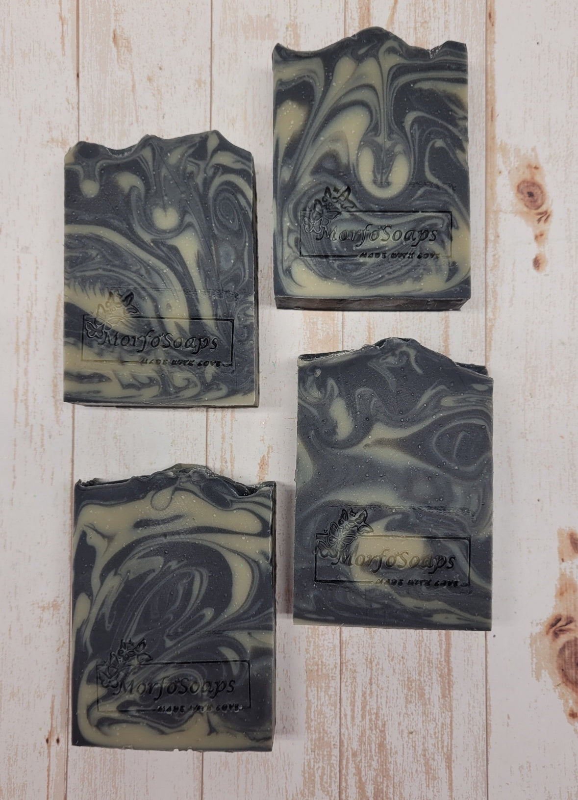 Handmade Patchouli & Frankincense Soap bar with natural ingredients, featuring a rich earthy color and unique texture.